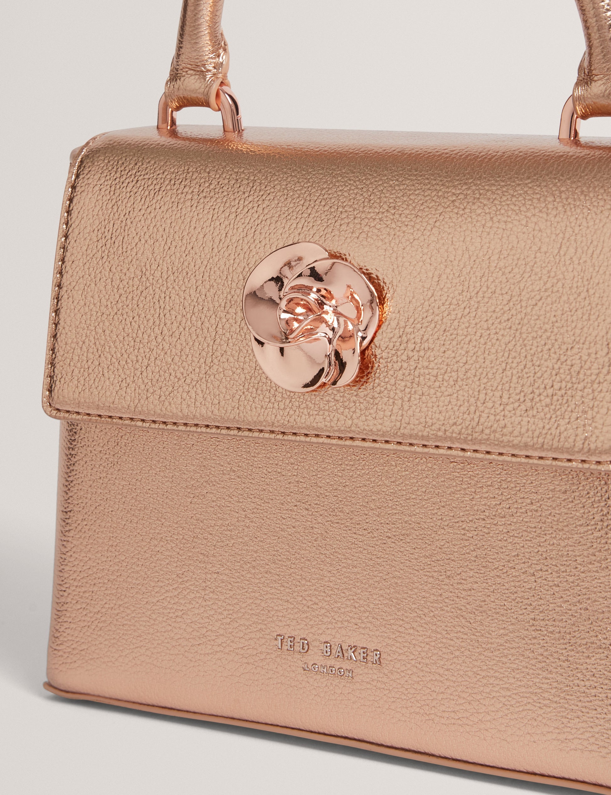 ROSAMA: Rose Detail Mini Metallic Top Handle Bag Ted Baker South Africa