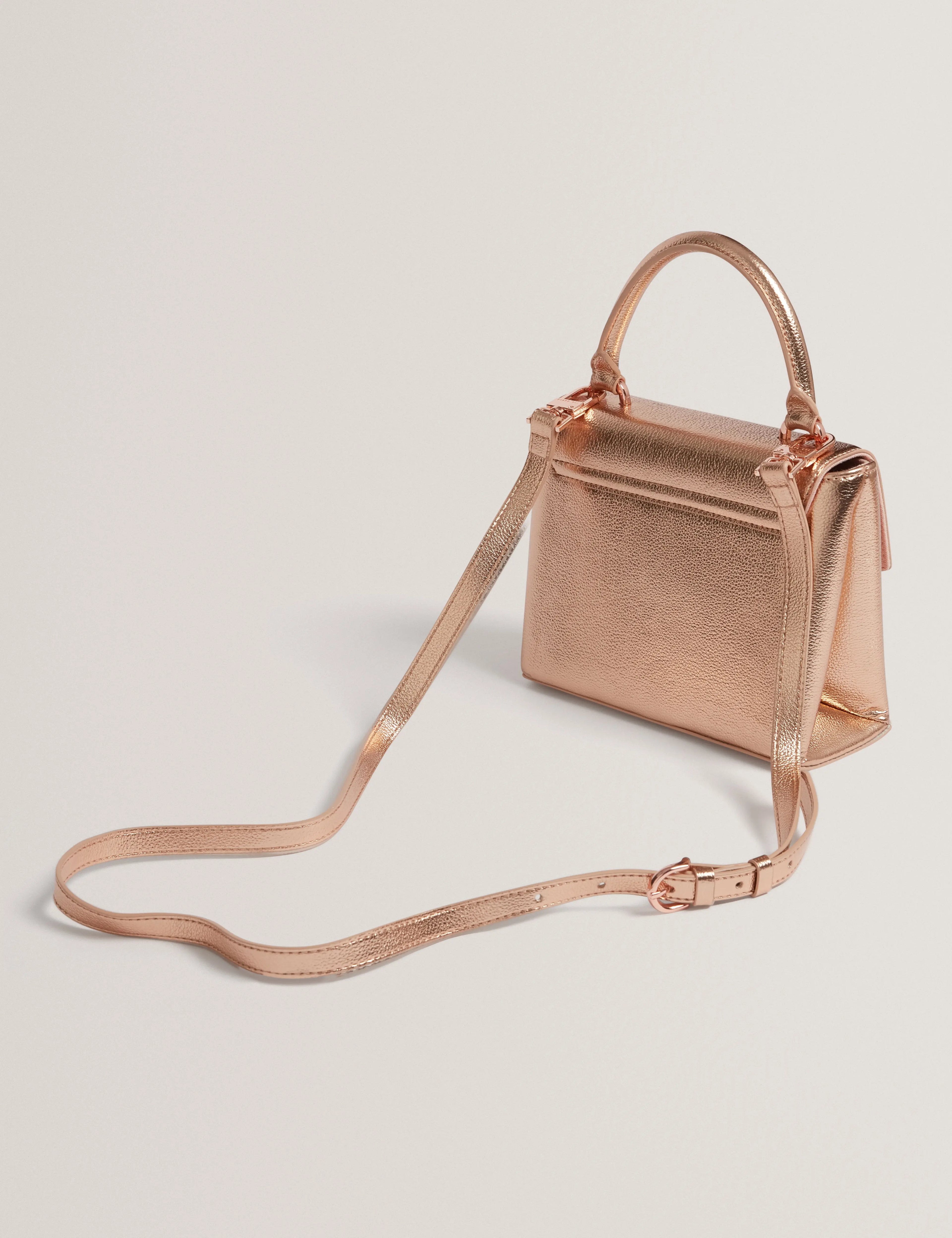 ROSAMA: Rose Detail Mini Metallic Top Handle Bag - Bellabags Ted Baker